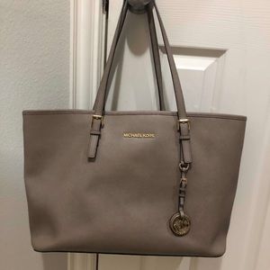 Grayish Micheal Kors tote purse